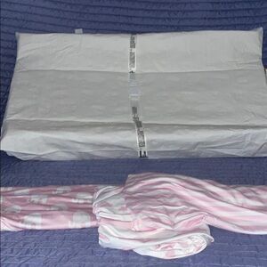 Pink and White Striped Baby changing pad and 3 covers